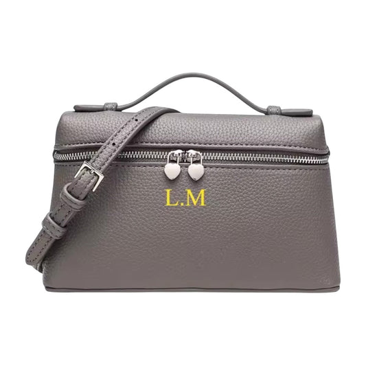 Lala Collection grey leather mini bag with top handle, adjustable strap, and personalized yellow initials L.M.