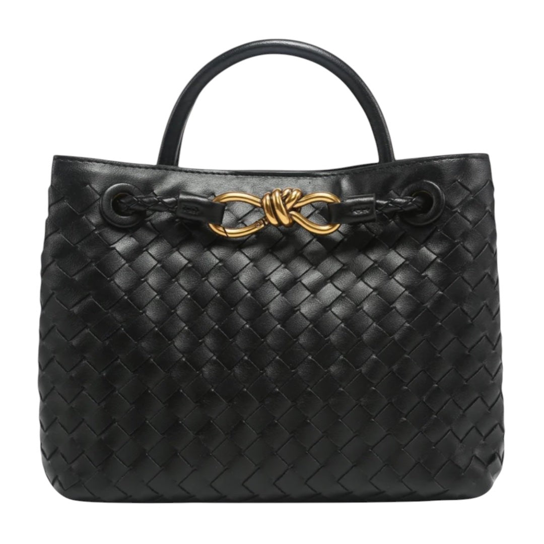Lala Collection black vegan leather handbag with hand-woven texture, gold hardware knot detail, and top handles.