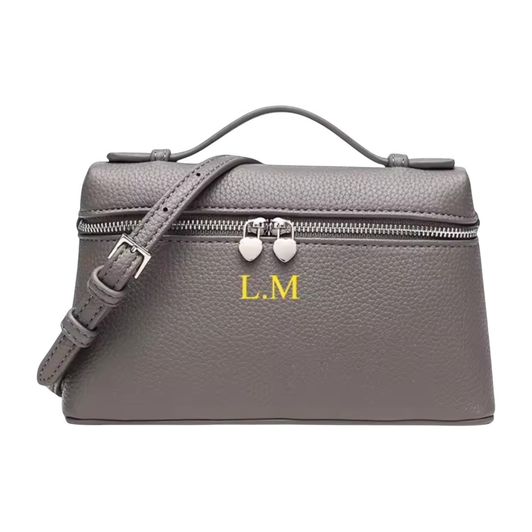 Lala Collection grey leather mini bag with top handle, adjustable strap, and personalized yellow initials L.M.