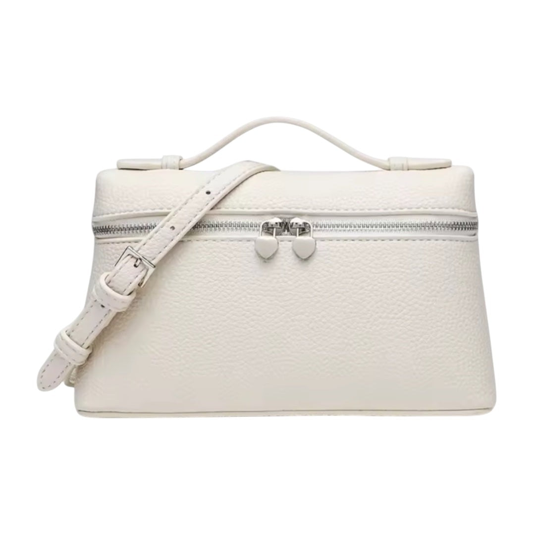 Lala Collection white Italian leather mini bag with a top handle, adjustable shoulder strap, and heart-shaped zippers.